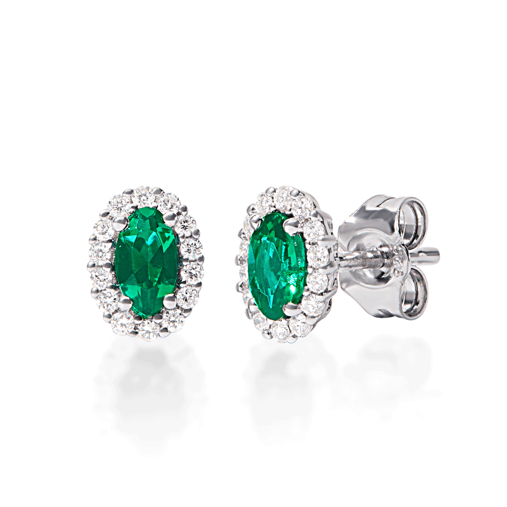 Created Emerald Stud Earrings with 0.14ct TDW of Laboratory Grown Diamonds in Rhodium Plated Sterling Silver Earrings Bevilles