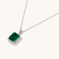 45cm Halo Oval Created Emerald Necklace with 0.18tw of Laboratory-Grown Diamonds in Sterling Silver and Platinum Pendants Bevilles
