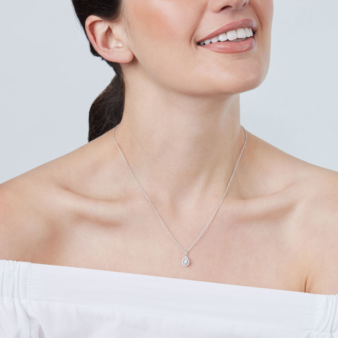 Diamond Set Pear Miracle Halo Necklace in Sterling Silver Necklaces Bevilles