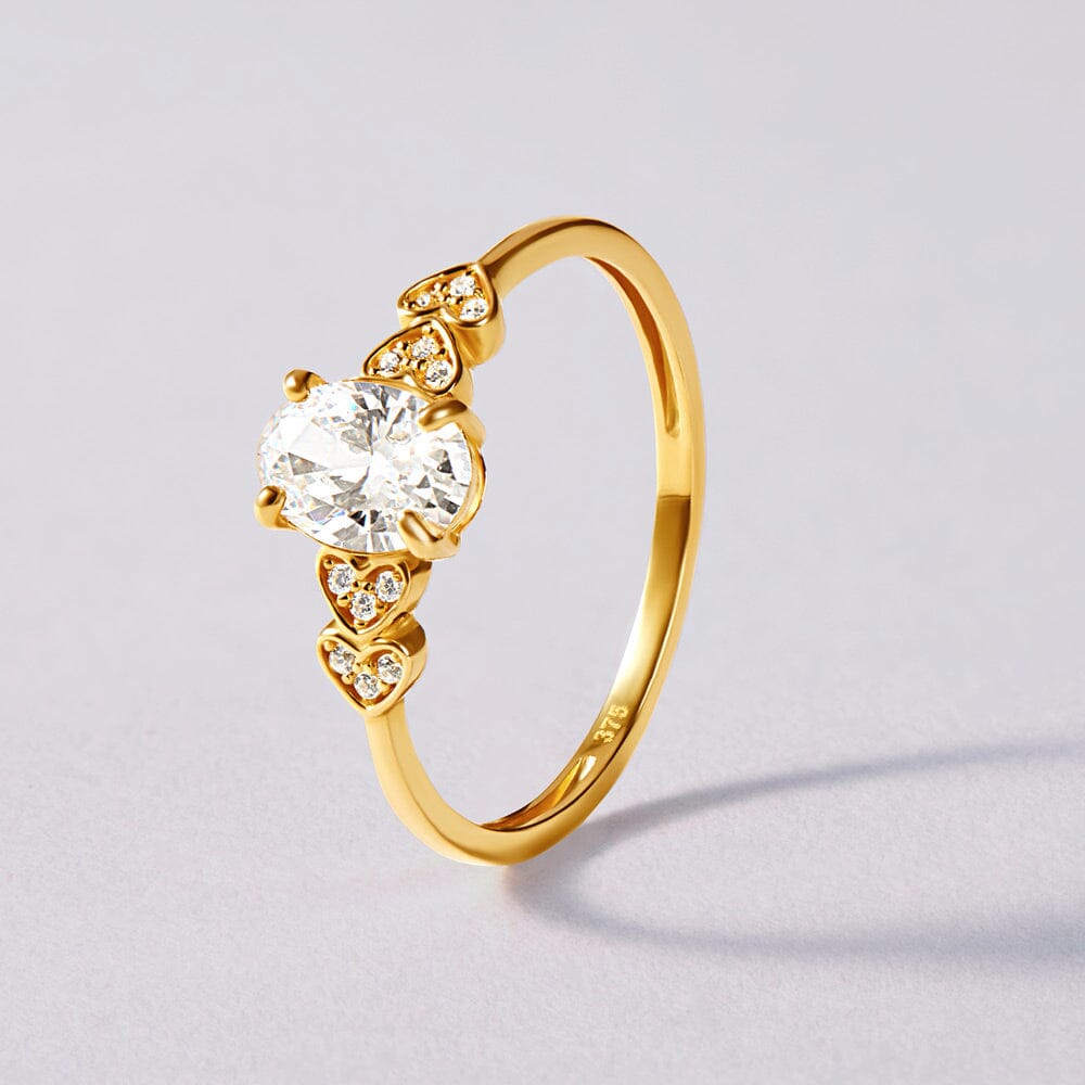 Oval and Hearts Ring with Cubic Zirconia in 9ct Yellow Gold Bevilles Jewellers 