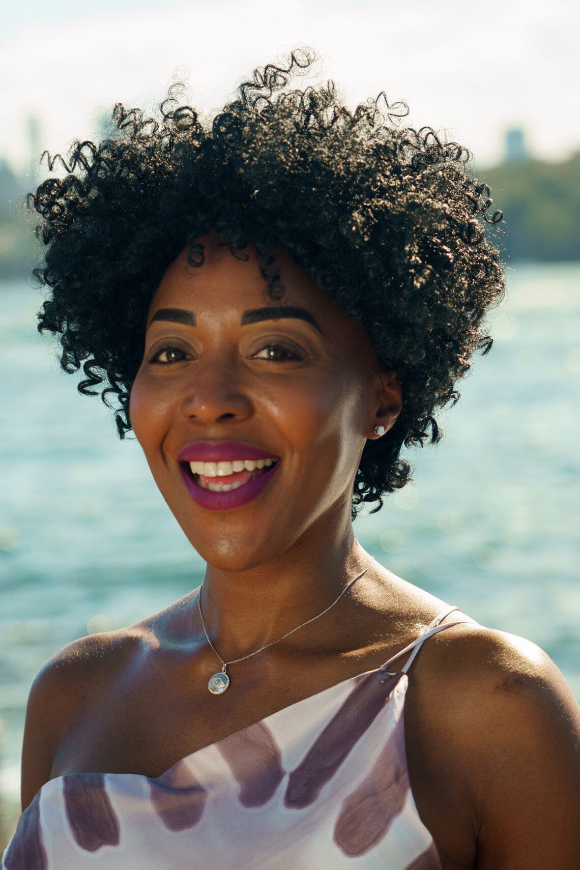 OPAL GLOW BLUE CREATED OPAL EVIL EYE MEDALION SILVER Bevilles Jewellers 