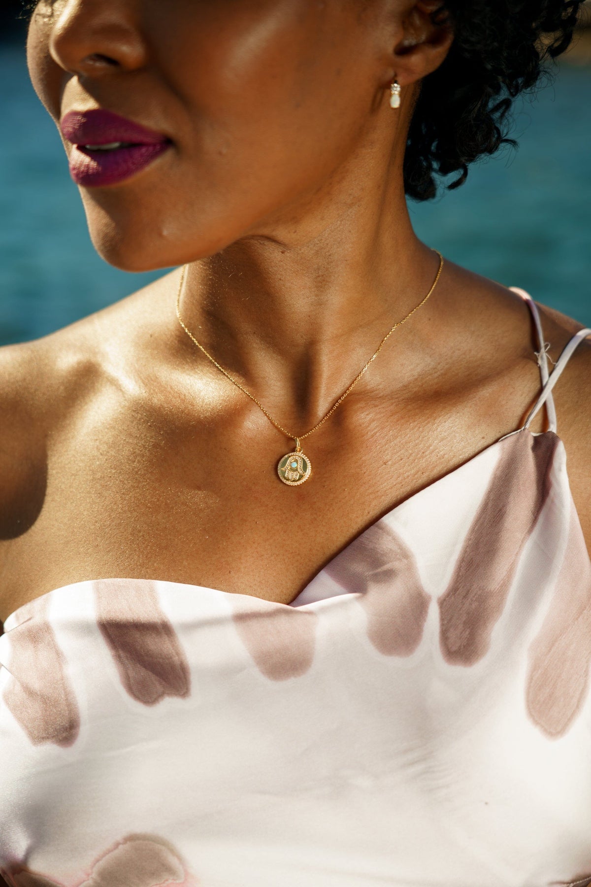 OPAL GLOW BLUE CREATED OPAL HAMSA MEDALION GOLD Bevilles Jewellers 