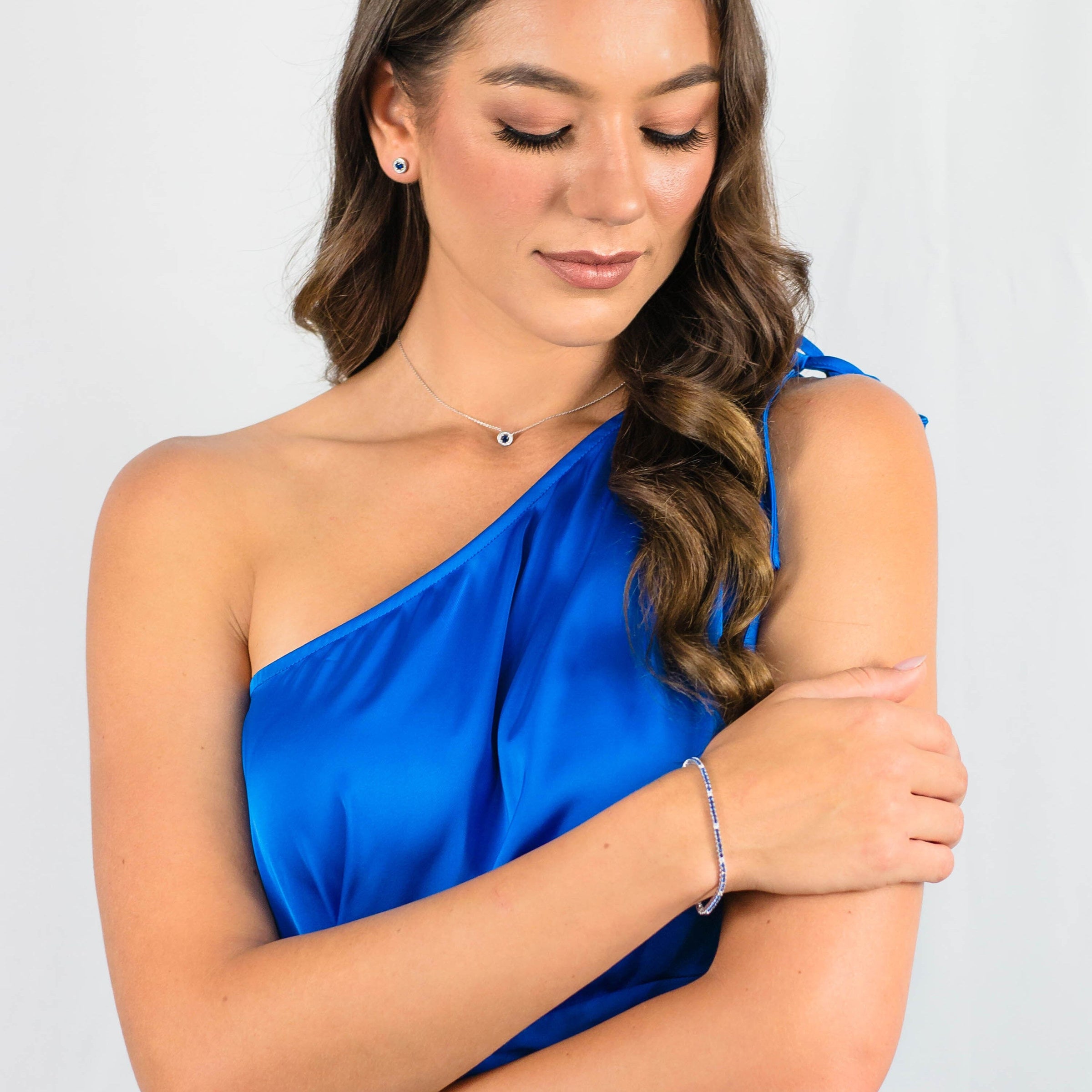MILESTONE SAPPHIRE HALO EARRINGS IN SILVER Bevilles Jewellers 