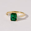 Solitaire Look Created Emerald Ring with 0.05ct in 9ct Yellow Gold Rings Bevilles 