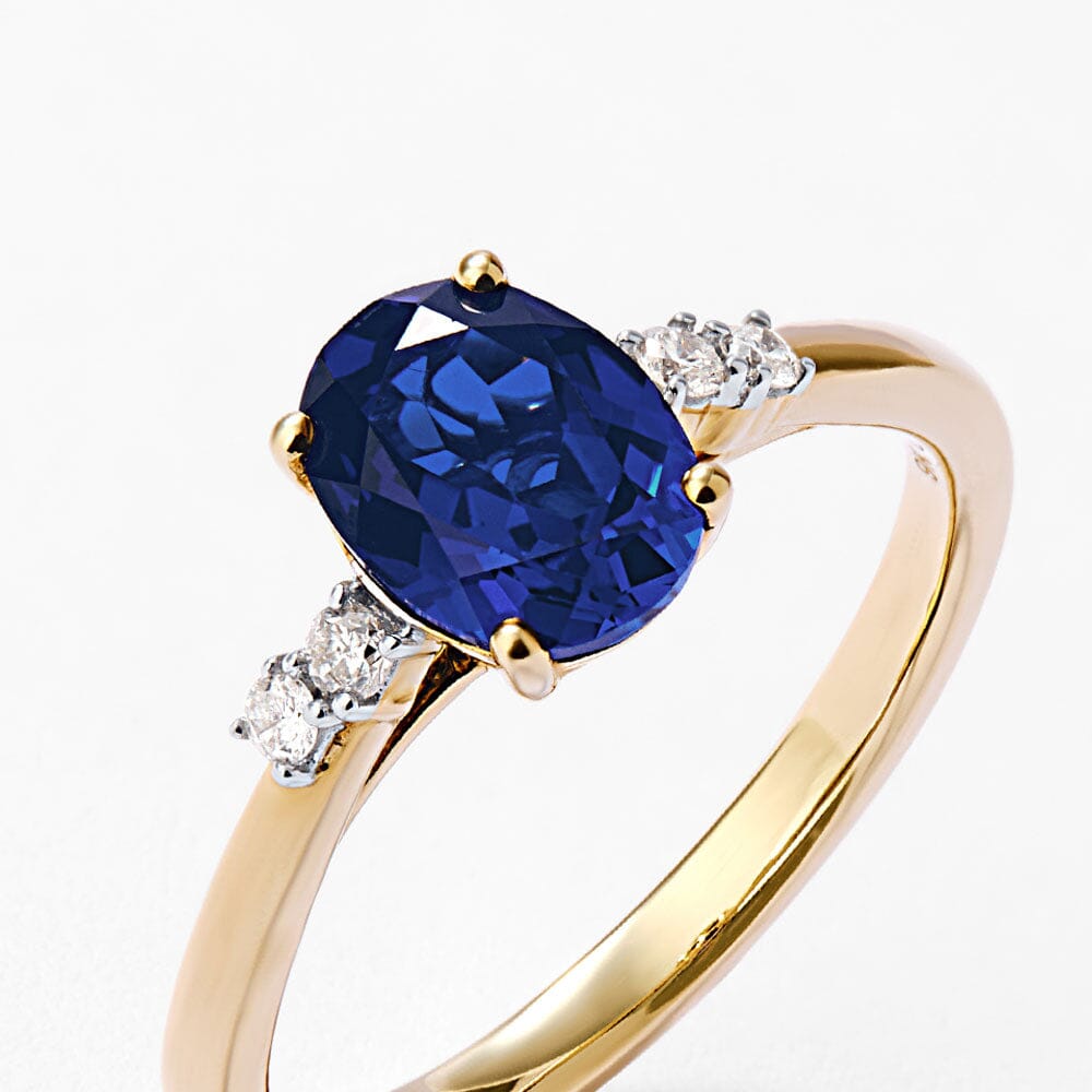 Created Saphire Ring with 0.07ct of Diamonds in 9kt Yellow Gold Rings Bevilles 