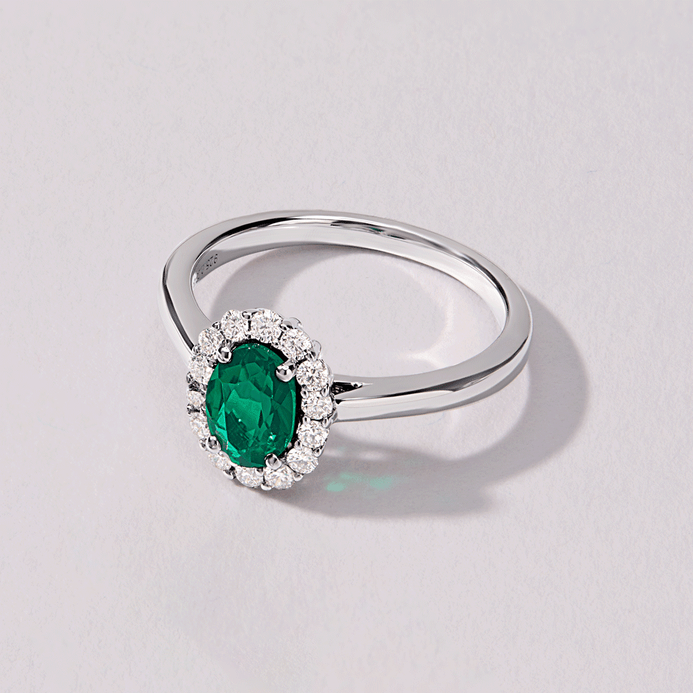 Oval Created Emerald Halo Ring with 0.23ct of Laboratory Grown Diamonds in Sterling Silver and Rhodium Rings Bevilles 
