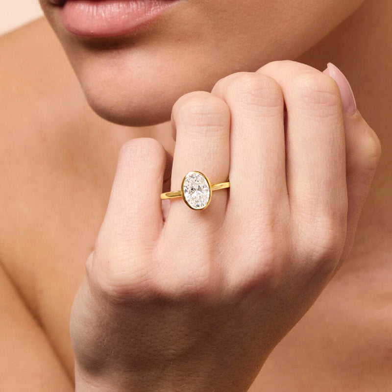 2.00ct Laboratory Grown Diamond Oval Cut Solitaire Ring in 18ct Yellow Gold Bevilles 