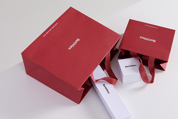 Red Bercolis packaging with a white product on a light gray background