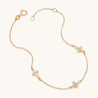 19cm Cubic Zirconia Station Cross Bracelet in 9kt Yellow Gold Bracelets Bevilles 