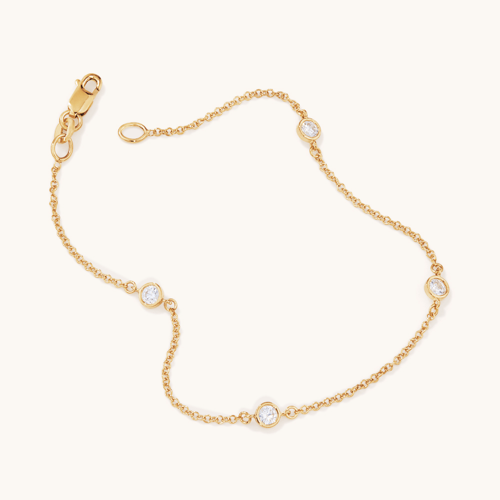 19cm Bezel Cubic Zirconia Station Curb Bracelet in 9kt Yellow Gold Bracelets Bevilles 