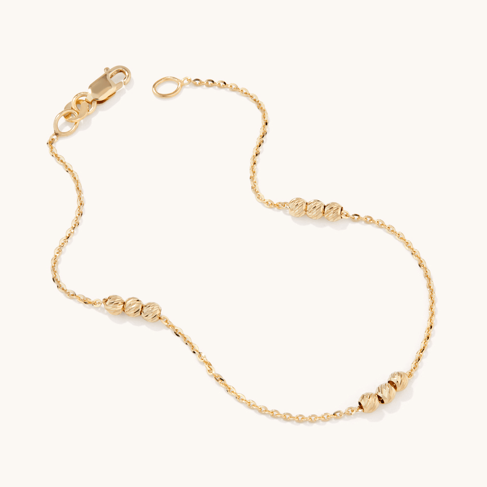 19cm Tripple Ball Station Cable Bracelet in 9kt Yellow Gold Bracelets Bevilles 