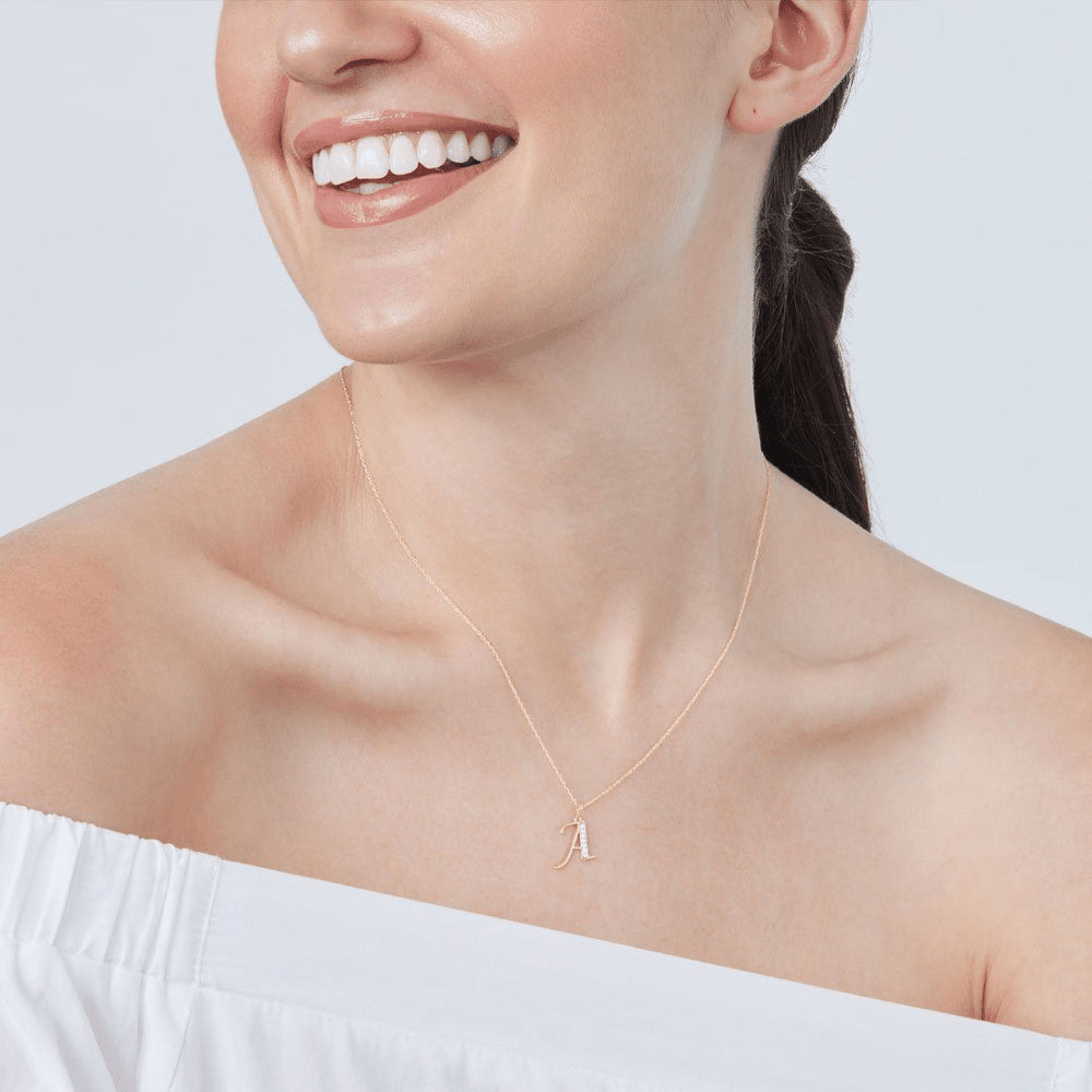 Diamond Set Initial Pendant in 9kt Yellow Gold Pendants Bevilles 