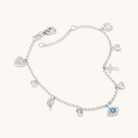 20.5cm Cubic Zirconia 9 Charm Bracelet in Sterling Silver Bracelets Bevilles 