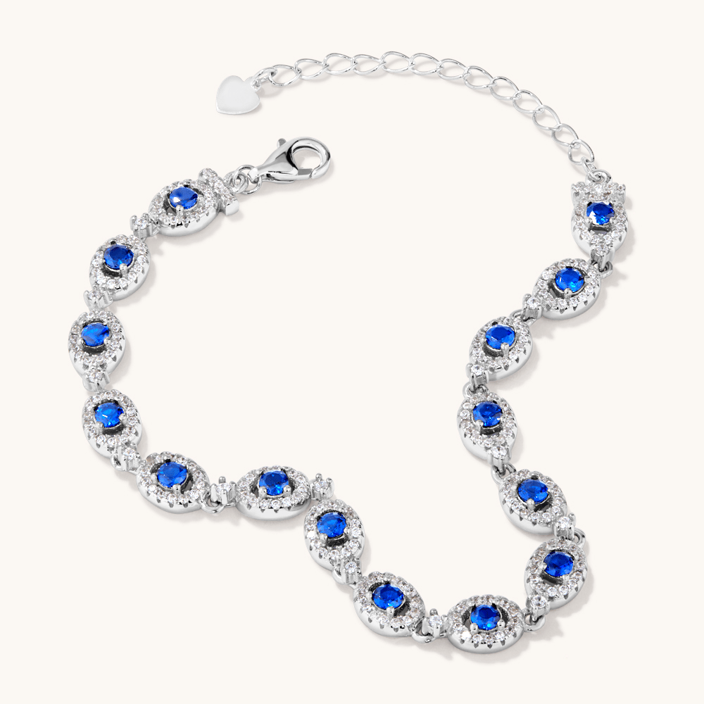 21.5cm 3mm Width Halo Bracelet with Blue Cubic Zirconias in Sterling Silver Bracelets Bevilles 