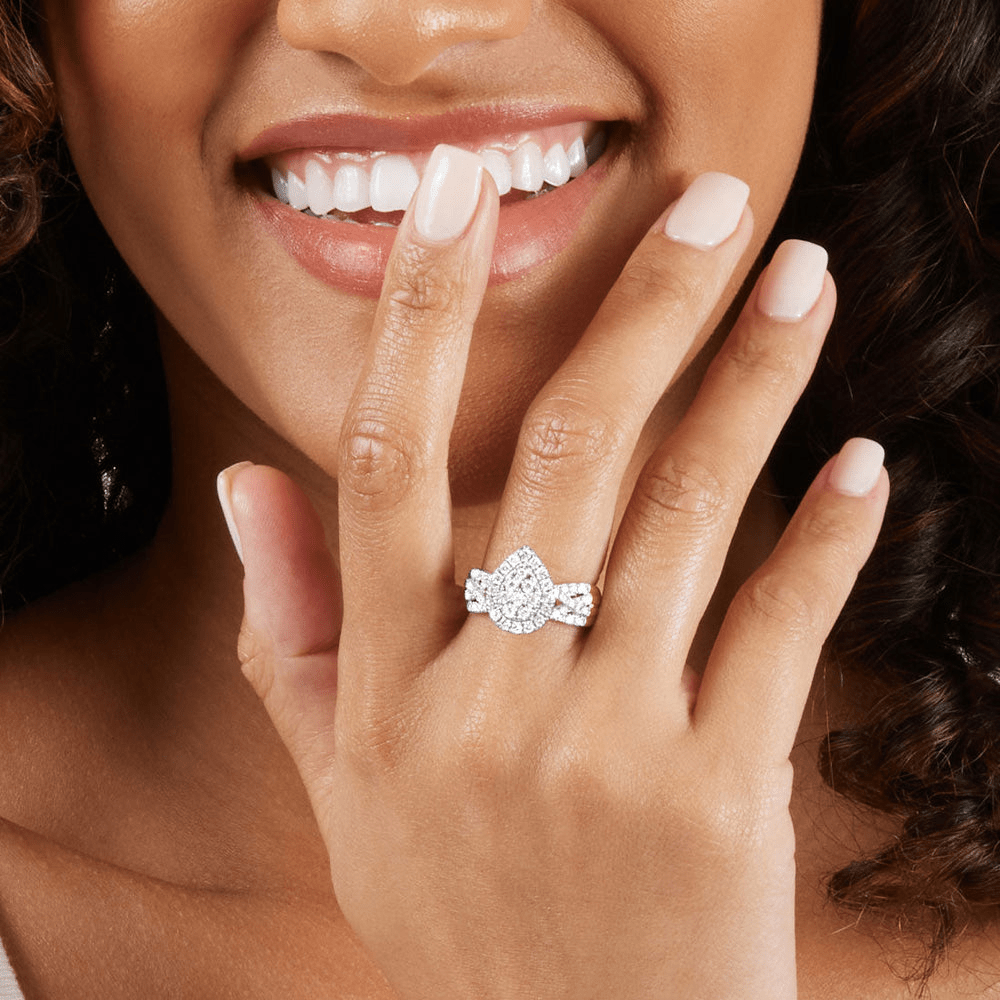 Pear Halo Ring with 1.00tw of Diamonds in 9kt Yellow Gold Rings Bevilles 