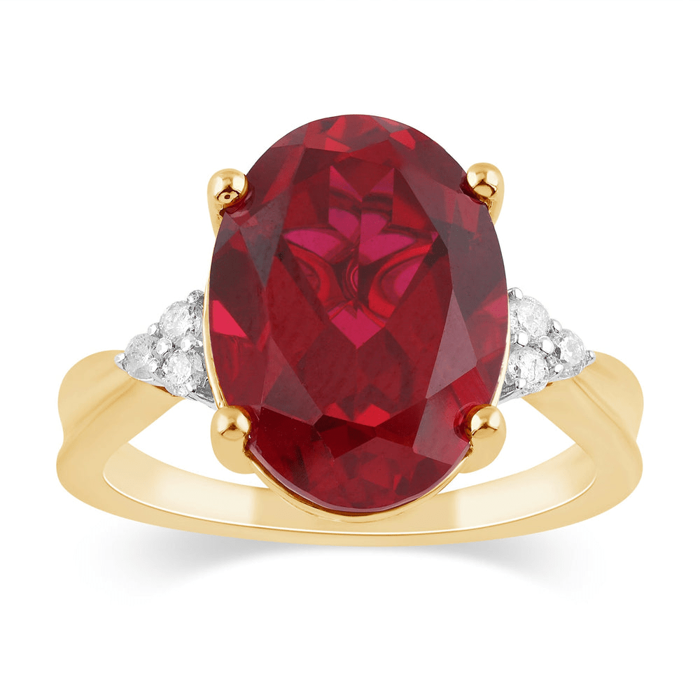 Oval Cut Created Ruby Ring with 0.10tw of Diamonds in 9kt Yellow Gold Rings Bevilles 