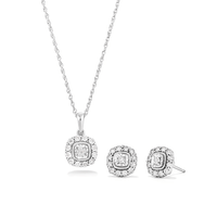 This stunning 45cm cushion shape halo pendant necklace and stud earrings two-piece set features 0.15ct total weight of diamonds in sterling silver. Suspended from a 1mm 45cm rope chain, this necklace Bevilles 