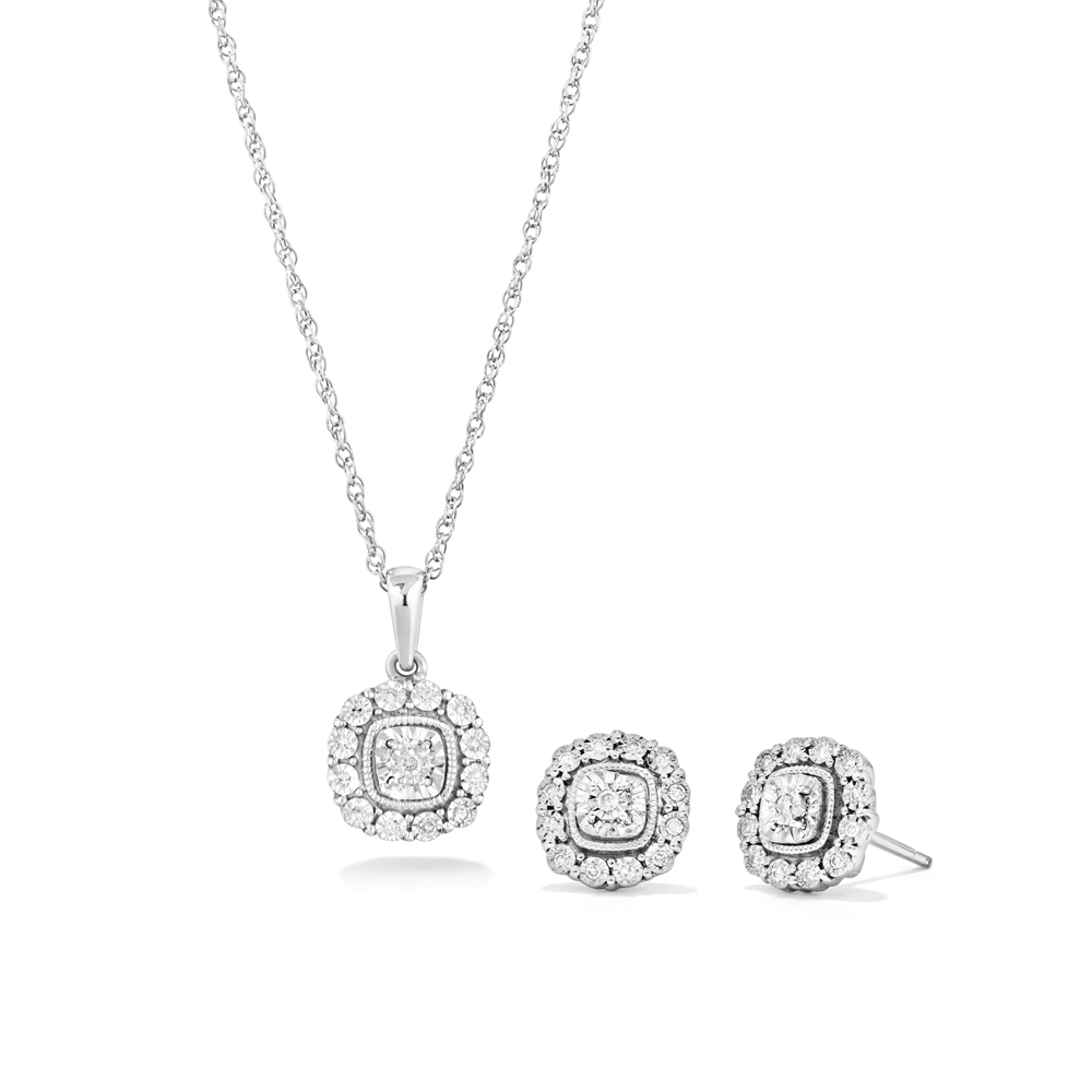 This stunning 45cm cushion shape halo pendant necklace and stud earrings two-piece set features 0.15ct total weight of diamonds in sterling silver. Suspended from a 1mm 45cm rope chain, this necklace Bevilles 