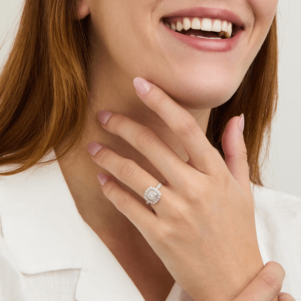 Fancy Surround Cushion Shaped Ring with 0.16tw of Diamonds in Sterling Silver Rings Bevilles 