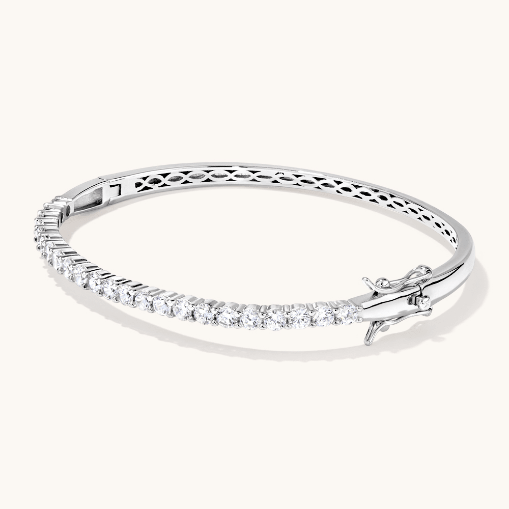 White Cubic Zirconia Waved Loop Bangle in Sterling Silver Bangles Bevilles 