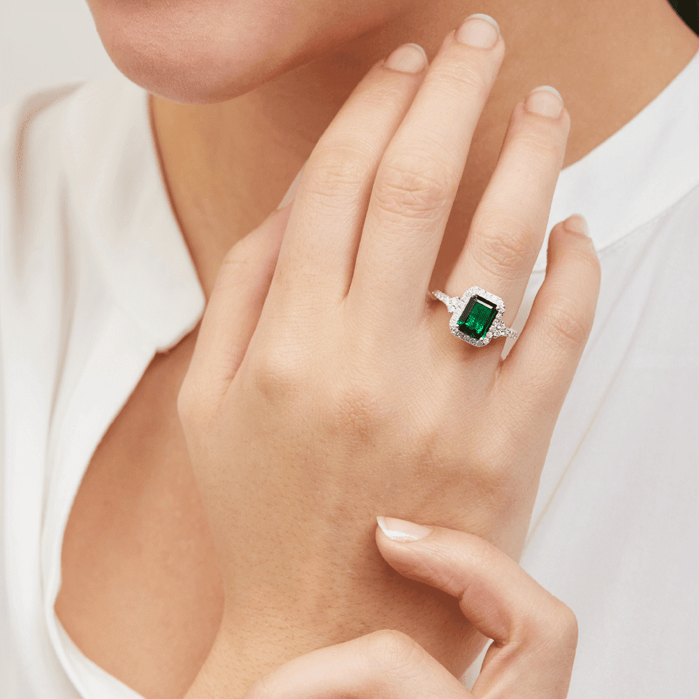 Created Emerald Halo Shoulder Ring with 0.50tw of Diamonds in 9kt White Gold Rings Bevilles 