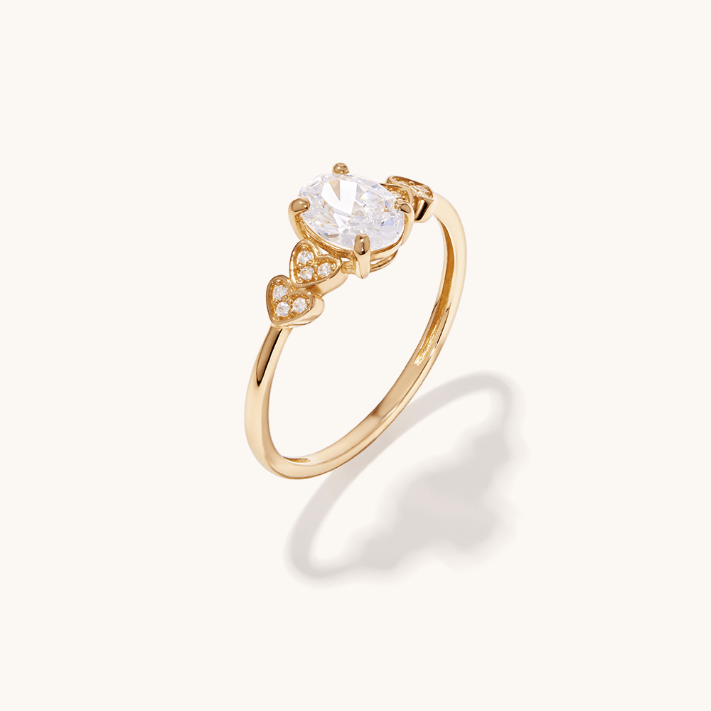 Cubic Zirconia Oval and Hearts Ring with in 9kt Yellow Gold Rings Bevilles 