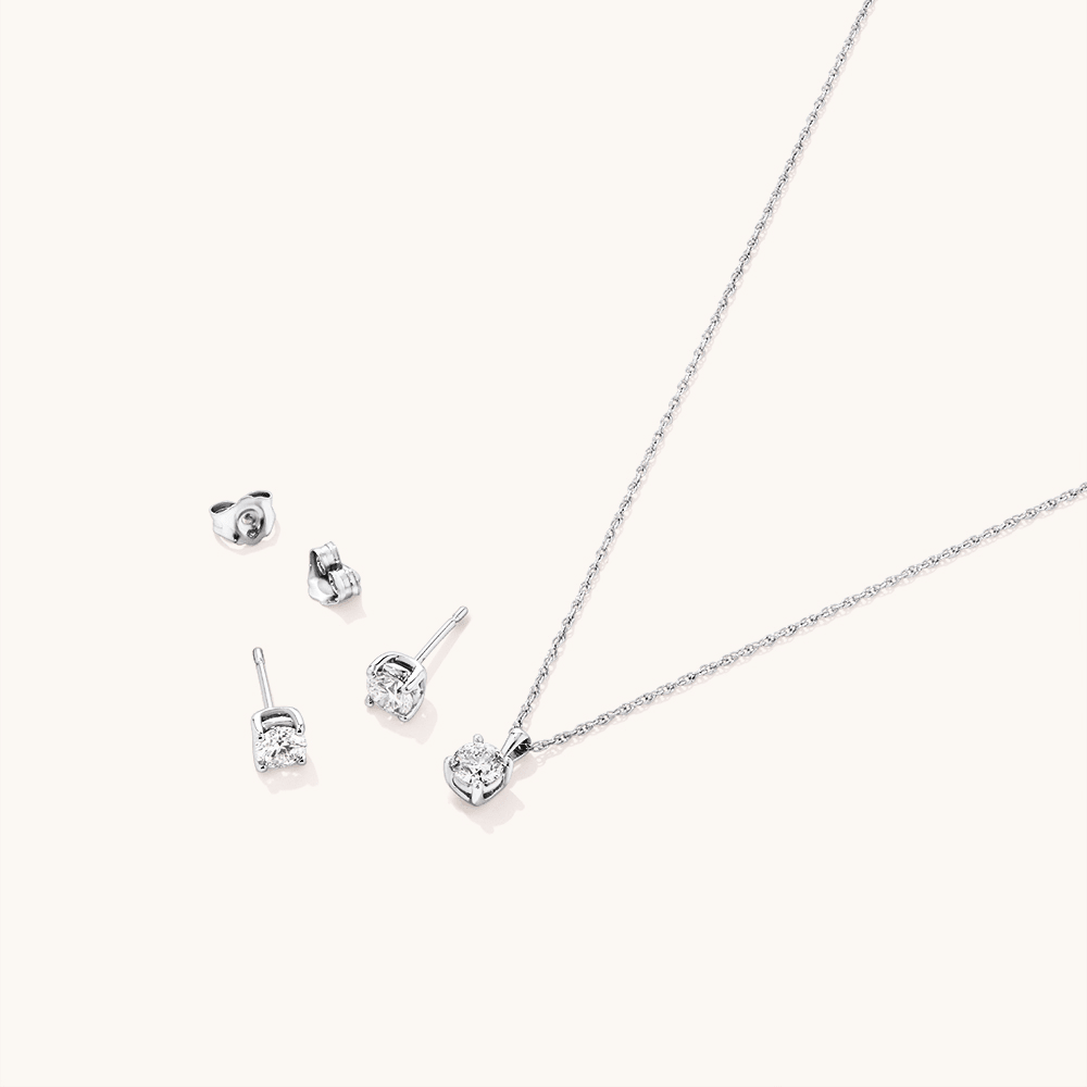 Solitaire Earring and Necklace Set with 1.00tw of Laboratory-Grown Diamonds in Sterling Silver and Platinum Bevilles 