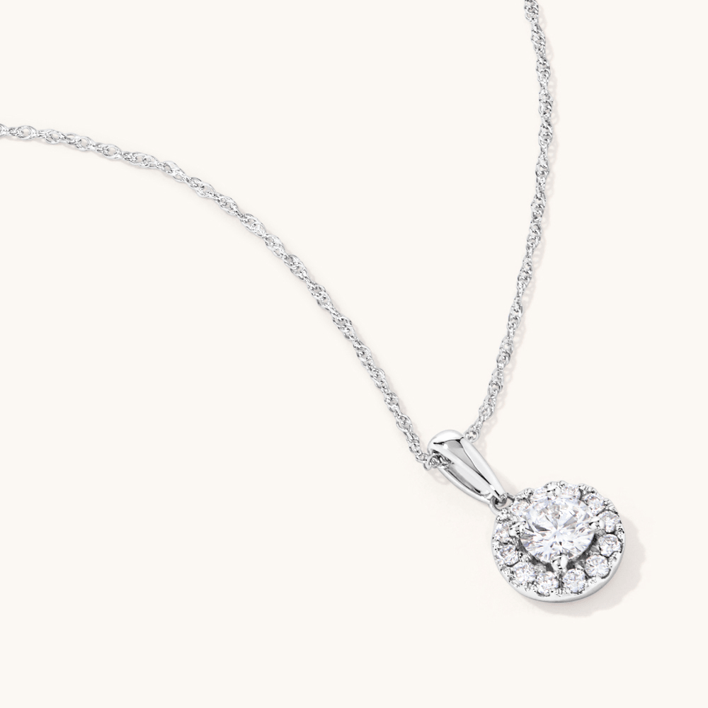 45cm Halo Solitaire Necklace with 0.50tw of Laboratory-Grown Diamonds in Sterling Silver and Platinum Pendants Bevilles 