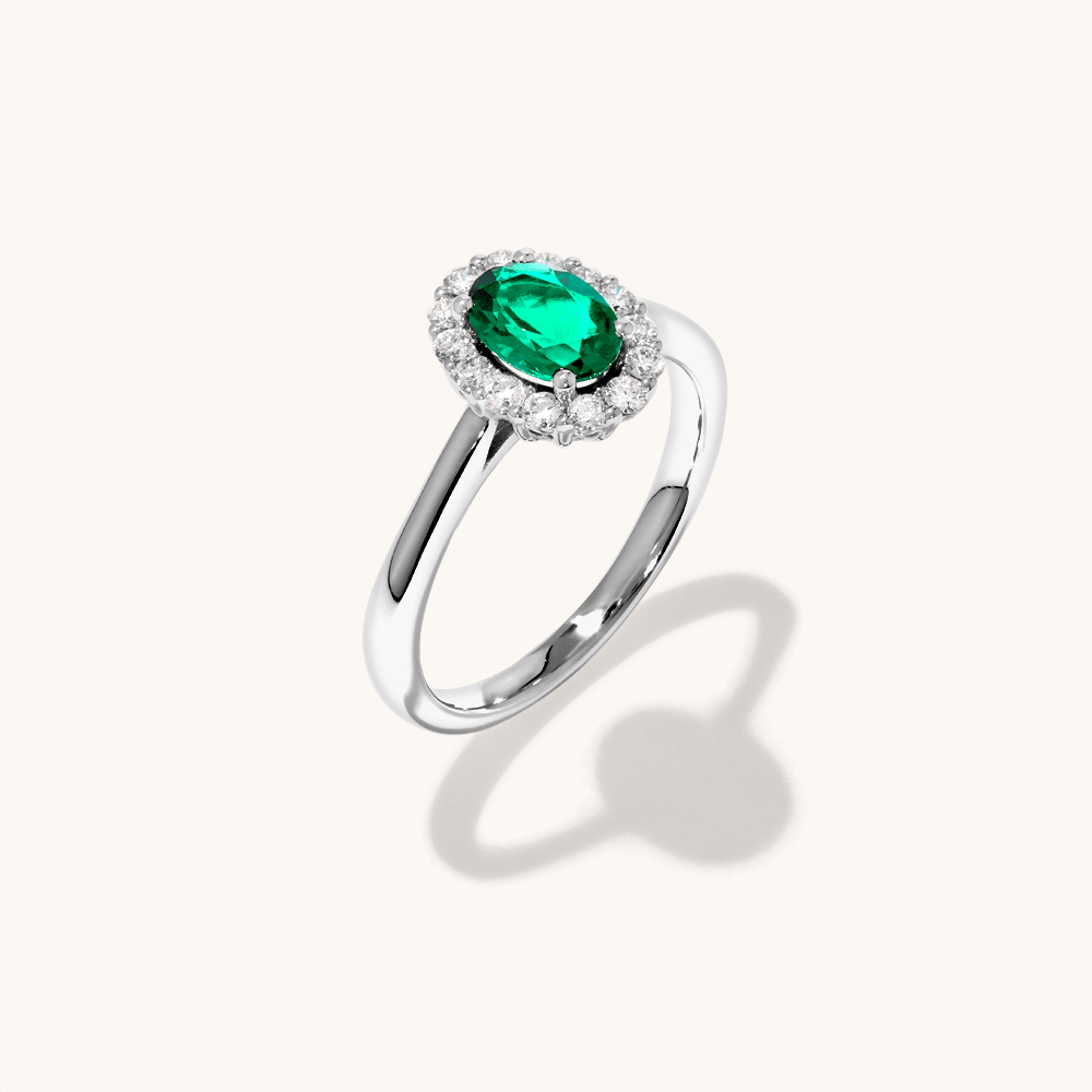 Oval Created Emerald Halo Ring with 0.23tw of Laboratory-Grown Diamonds in Rhodium Plated Sterling Silver Rings Bevilles 