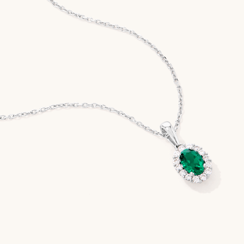 45cm Oval Created Emerald Halo Necklace with 0.13tw of Laboratory-Grown Diamonds in Rhodium Plated Sterling Silver Pendants Bevilles 