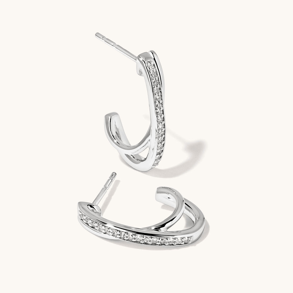 Crossover Huggie Earrings with 0.10tw of Laboratory-Grown Diamonds in Sterling Silver and Platinum Earrings Bevilles 