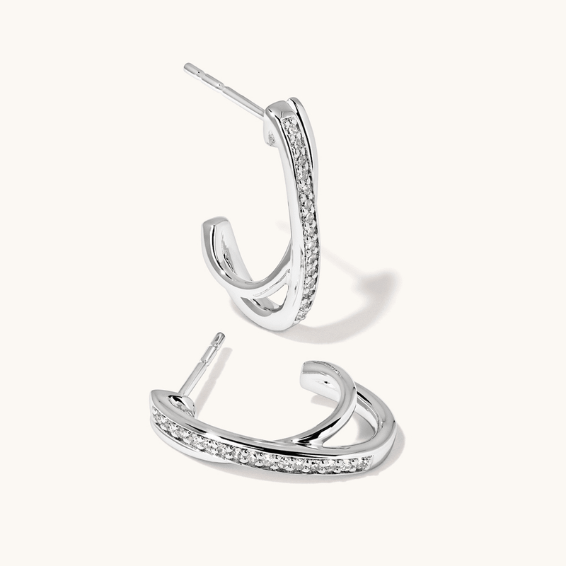 Crossover Huggie Earrings with 0.10tw of Laboratory-Grown Diamonds in Sterling Silver and Platinum Earrings Bevilles 