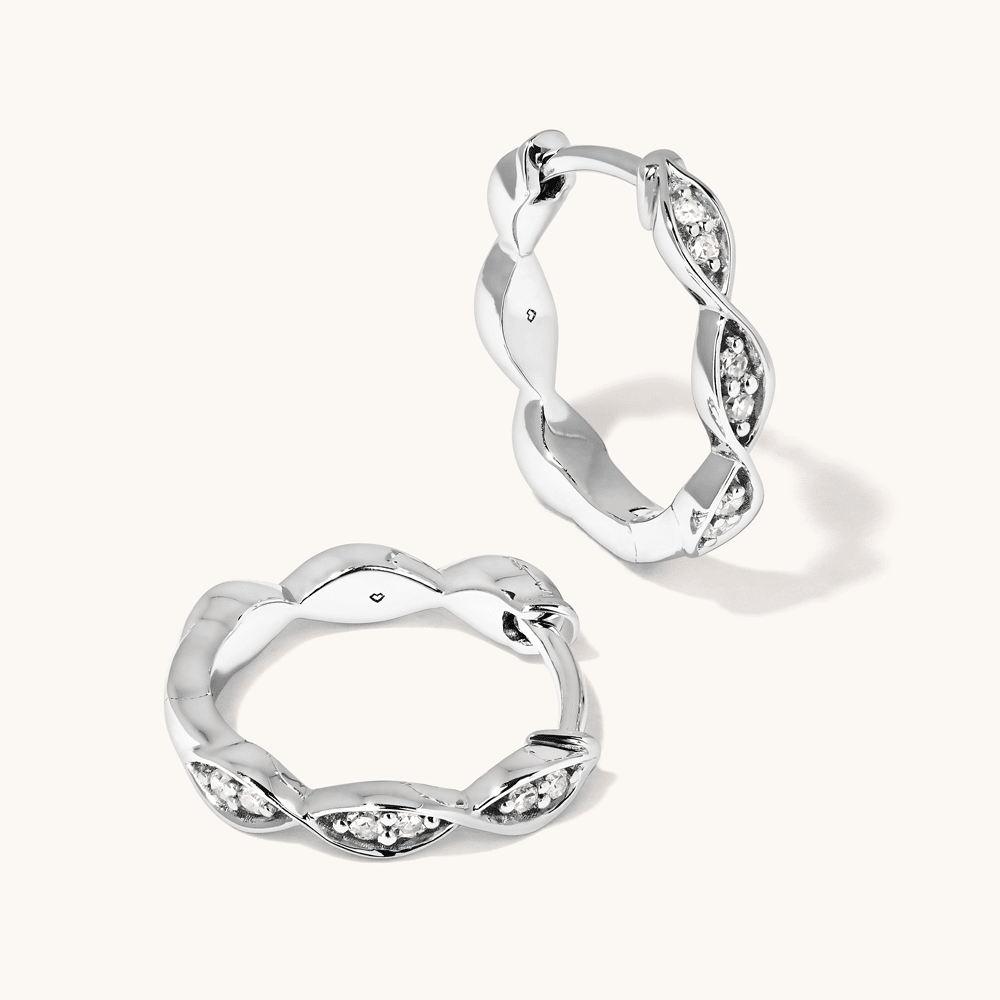Twist Huggie Earrings with 0.10tw of Laboratory-Grown Diamonds in Sterling Silver and Platinum Earrings Bevilles 