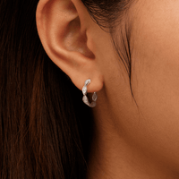 Twist Huggie Earrings with 0.10tw of Laboratory-Grown Diamonds in Sterling Silver and Platinum Earrings Bevilles 