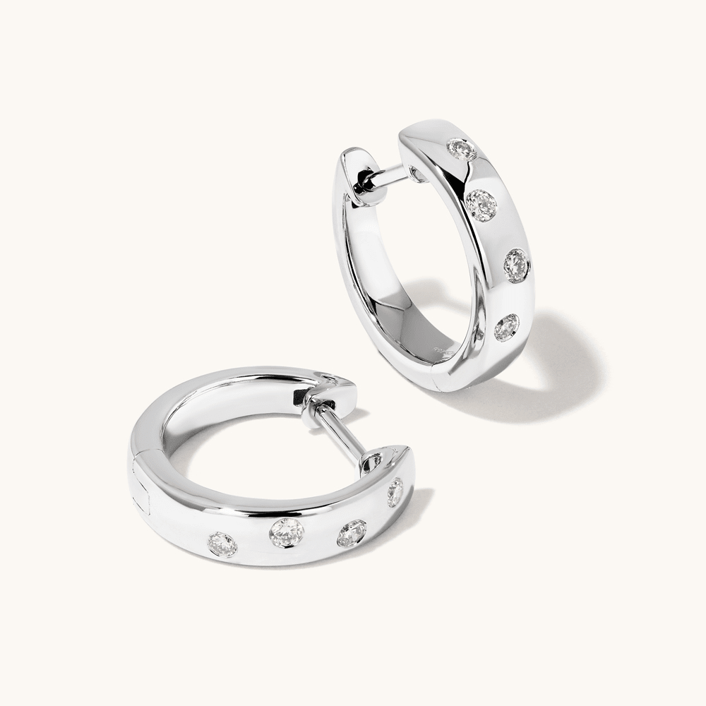 Hammer Set Huggie Earrings with 0.10tw of Laboratory-Grown Diamonds in Sterling Silver and Platinum Earrings Bevilles 