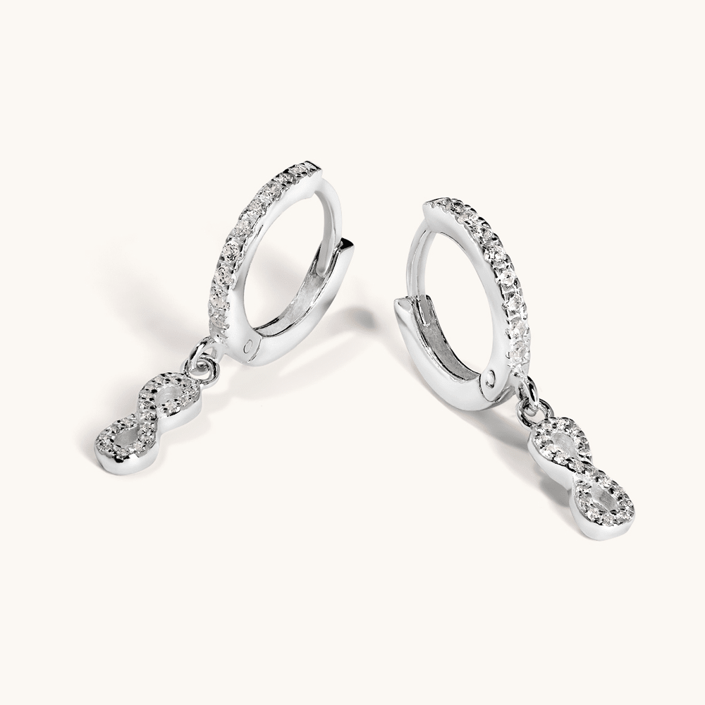 Cubic Zirconia Infinity Charm Huggie Earrings in Sterling Silver Earrings Bevilles 