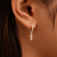 Cubic Zirconia Infinity Charm Huggie Earrings in Sterling Silver Earrings Bevilles 