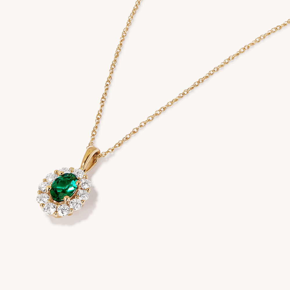 45cm Oval Created Emerald Halo Pendant Necklace with 0.46tw of Laboratory-Grown Diamonds in 9kt Yellow Gold Pendants Bevilles 