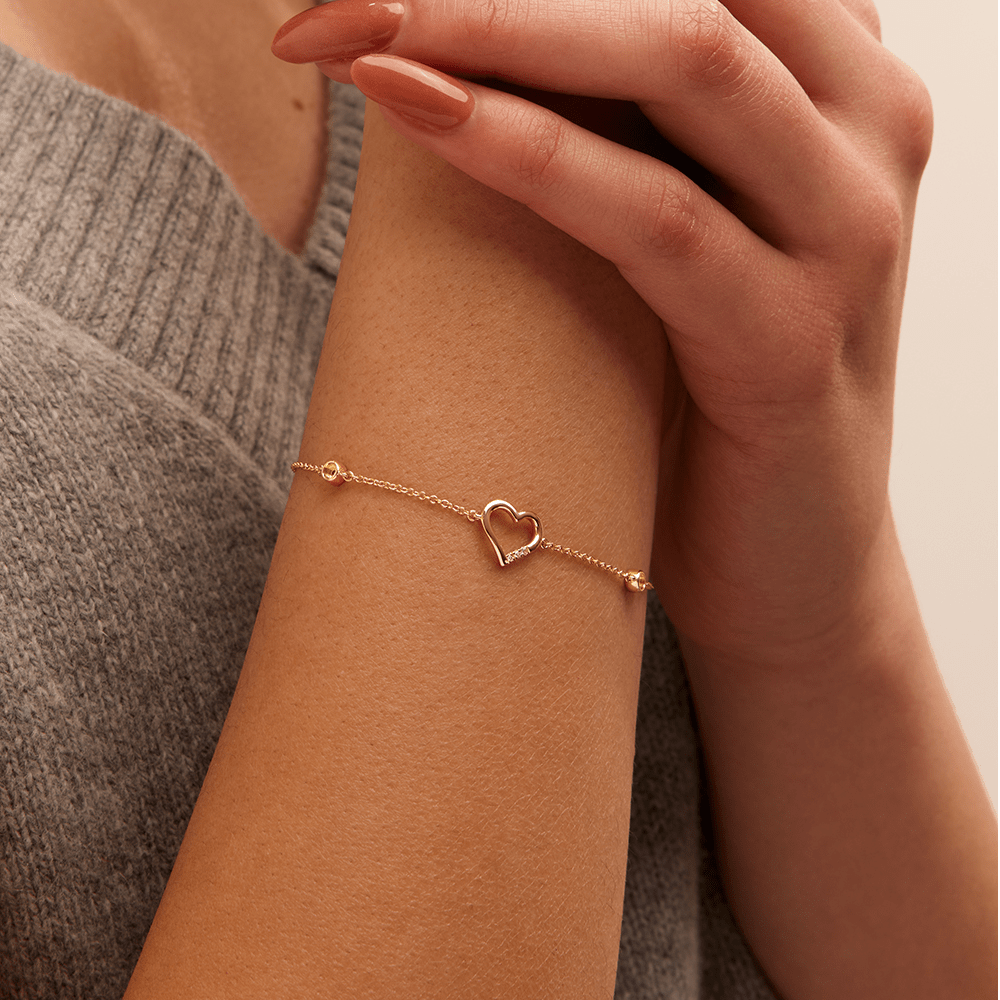 19cm Heart Station Bracelet with 0.05tw of Laboratory-Grown Diamonds in 9kt Yellow Gold Bracelets Bevilles 