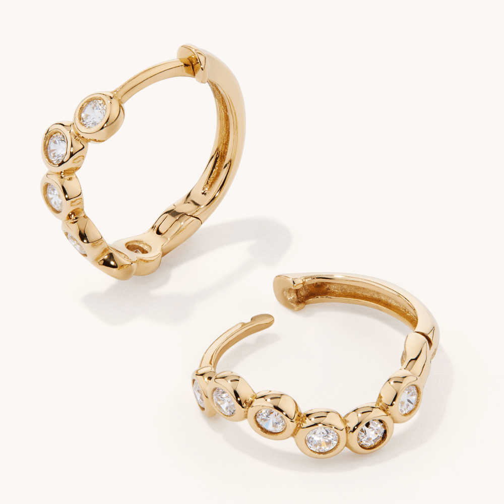 Cubic Zirconia Wave Huggie Earrings in 9kt Yellow Gold Earrings Bevilles 