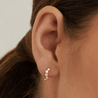 Cubic Zirconia Wave Huggie Earrings in 9kt Yellow Gold Earrings Bevilles 