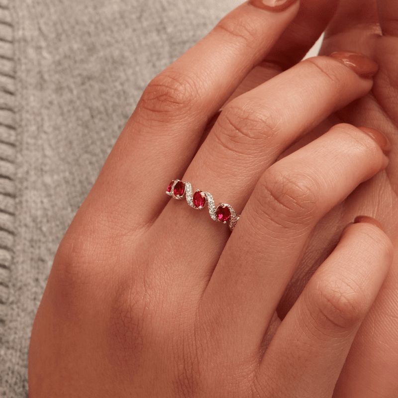Oval Created Ruby Swirl Ring with 0.14tw of Laboratory-Grown Diamonds in Sterling Silver and Platinum Rings Bevilles 