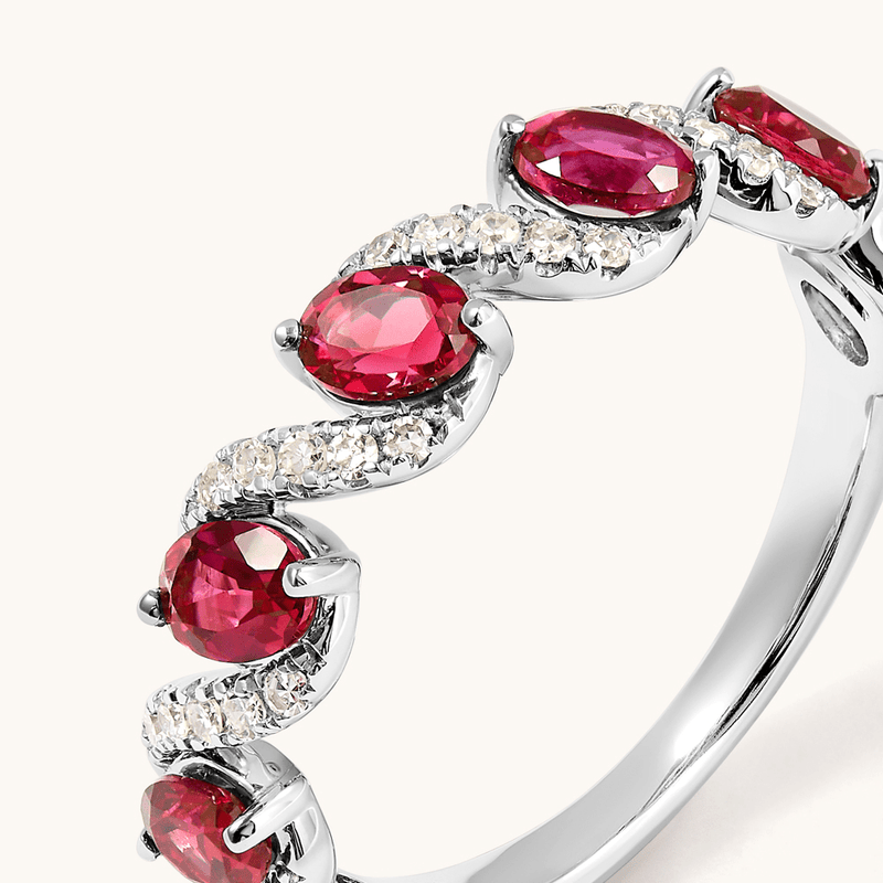 Oval Created Ruby Swirl Ring with 0.14tw of Laboratory-Grown Diamonds in Sterling Silver and Platinum Rings Bevilles 