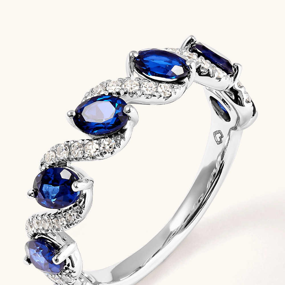 Oval Created Sapphire Swirl Ring with 0.14tw of Laboratory-Grown Diamonds in Sterling Silver and Platinum Rings Bevilles 