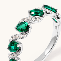 Oval Created Emerald Swirl Ring with 0.14tw of Laboratory-Grown Diamonds in Sterling Silver and Platinum Rings Bevilles 