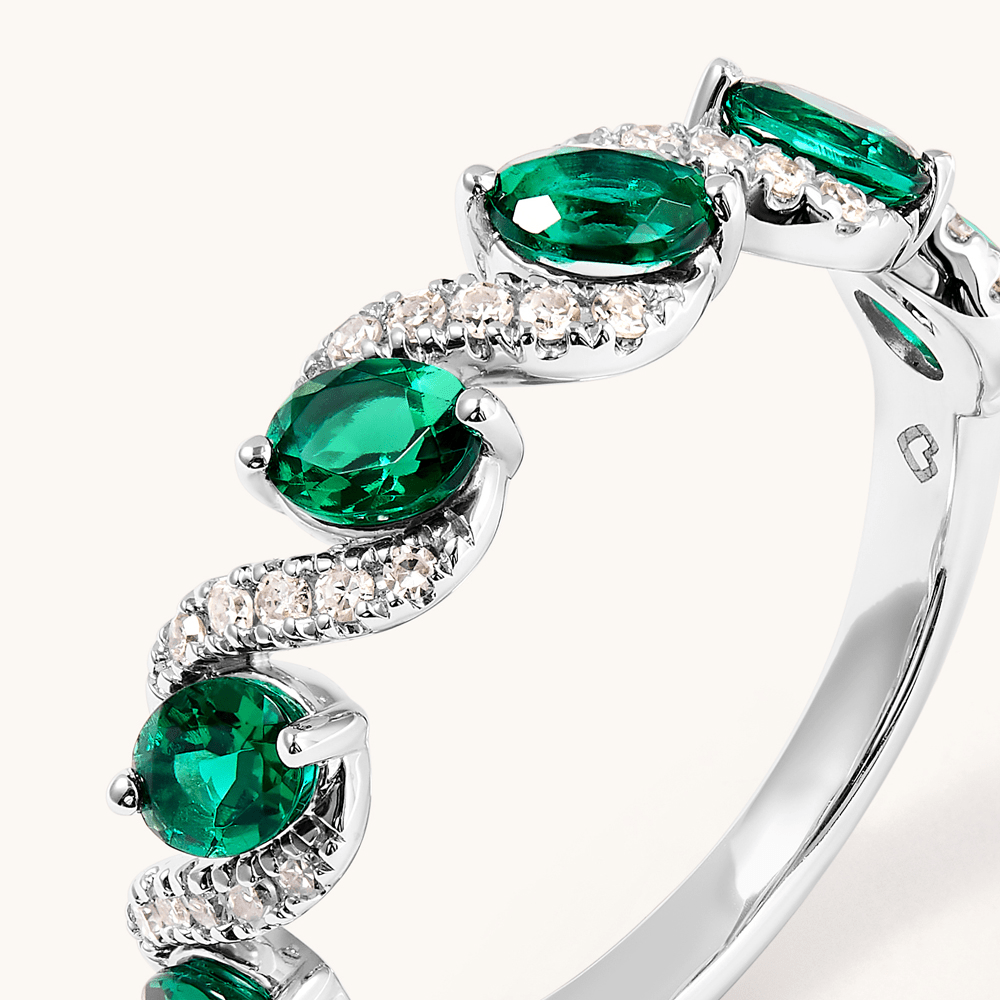 Oval Created Emerald Swirl Ring with 0.14tw of Laboratory-Grown Diamonds in Sterling Silver and Platinum Rings Bevilles 