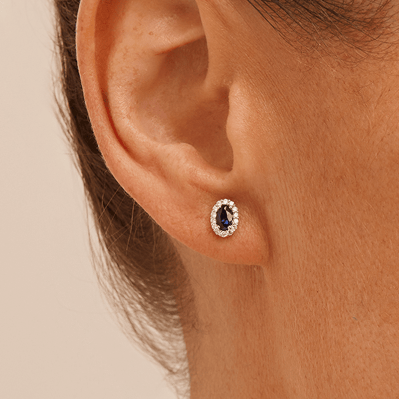 Oval Created Sapphire Halo Stud Earrings with 0.14tw of Laboratory-Grown Diamonds in Sterling Silver and Platinum Earrings Bevilles 