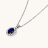 45cm Oval Created Sapphire Halo Pendant Necklace with 0.13tw of Laboratory-Grown Diamonds in Sterling Silver and Platinum Pendants Bevilles 