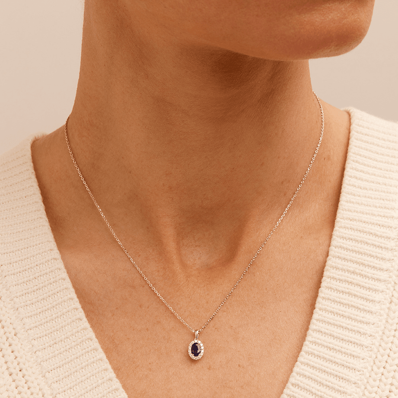 45cm Oval Created Sapphire Halo Pendant Necklace with 0.13tw of Laboratory-Grown Diamonds in Sterling Silver and Platinum Pendants Bevilles 