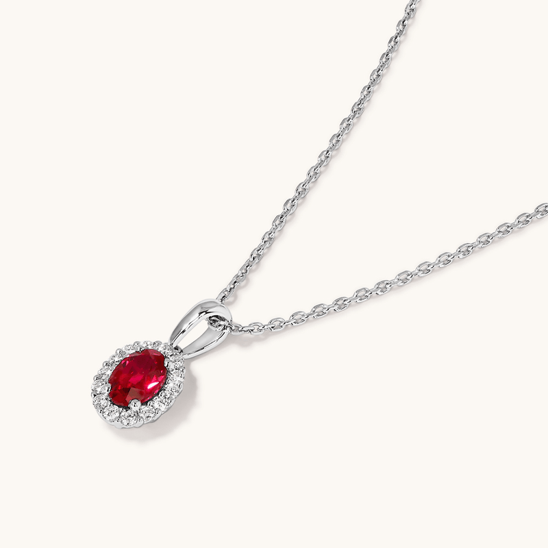 45cm Oval Created Ruby Halo Pendant Necklace with 0.13tw of Laboratory-Grown Diamonds in Sterling Silver and Platinum Pendants Bevilles 